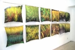 "RIISIPÕLDUDE MAA KOREA" installatsioon patjadest 2011  20-50 patja mõõdus 60x60 cm  kangale trükitud Korea riisipõldude fotod, padjatäidis,bambuspulk <br />"KOREA- THE LAND OF RICE FIELDS" installation of pillows 2011  20-50 pillows measures 60x60 cm  photos of rice fields printed on canvas,pillowfill,bamboo